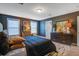 Serene bedroom featuring dark walls, natural light, and a comfortable, inviting space at 3306 Hartwell St, Johns Island, SC 29455