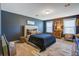 Stylish bedroom showcasing dark walls, natural light, and a comfortable, inviting space at 3306 Hartwell St, Johns Island, SC 29455