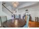 Dining area with elegant lighting fixture opens to staircase and entry hall at 3306 Hartwell St, Johns Island, SC 29455