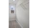 Walk-in closet featuring carpet flooring, wire shelving, and a bright window at 331 Bremerton Dr, Goose Creek, SC 29445