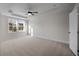 Bedroom featuring carpeted floors, a ceiling fan, tray ceiling, and a window at 337 Bremerton Dr, Goose Creek, SC 29445