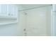 Bathroom with a shower and white vanity with storage at 338 King St # C, Charleston, SC 29401