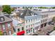 Aerial view showcasing building and surrounding city neighborhood at 338 King St # C, Charleston, SC 29401