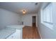 Bright kitchen features granite countertop, wood-look flooring, and modern cabinetry at 338 King St # C, Charleston, SC 29401