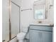 Stylish bathroom with modern vanity, quartz countertop, and glass-enclosed shower at 3802 Grateful Rd, North Charleston, SC 29420
