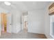 Bright bedroom with carpet, featuring access to an en-suite bathroom and hallway at 3802 Grateful Rd, North Charleston, SC 29420