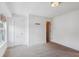 Minimalist bedroom featuring carpeted floors and a large window for ample natural light at 3802 Grateful Rd, North Charleston, SC 29420