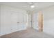 Neutral bedroom with large closets, ceiling fan, and views to the other rooms at 3802 Grateful Rd, North Charleston, SC 29420