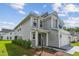 This two-story home with attached garage and a well-maintained lawn at 3802 Grateful Rd, North Charleston, SC 29420