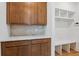 Mudroom with beautiful cabinets, quartz countertops, subway tile backsplash, and convenient built-in bench at 3802 Grateful Rd, North Charleston, SC 29420