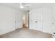 Bedroom with carpet, a closet, and ensuite bathroom for an in-home private oasis at 3806 Grateful Rd, North Charleston, SC 29420