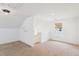 Inviting bonus room with carpet, a window, and cozy lighting at 3806 Grateful Rd, North Charleston, SC 29420