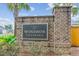 A brick sign reading 'Windsor Crossing' with surrounding landscaping at 3806 Grateful Rd, North Charleston, SC 29420