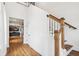 Staircase in the entryway leading to the upper level, with an open view of the kitchen at 3806 Grateful Rd, North Charleston, SC 29420