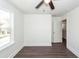 Bright bedroom featuring luxury vinyl plank flooring and a ceiling fan at 405 Simmons Ave, Summerville, SC 29483