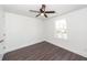 This bedroom has luxury vinyl plank flooring, a ceiling fan, and natural lighting at 405 Simmons Ave, Summerville, SC 29483