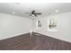 Spacious bedroom with hardwood floors, natural light, and a ceiling fan at 405 Simmons Ave, Summerville, SC 29483