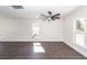 Bright living room featuring hardwood floors, crown molding and lots of natural light at 405 Simmons Ave, Summerville, SC 29483