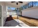 Covered patio with ceiling fan overlooking the backyard and detached garage at 405 Simmons Ave, Summerville, SC 29483