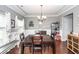 Dining room with hardwood floors, decorative lighting, and ample space for entertaining at 415 True North Trail, Summerville, SC 29486