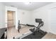 Bright exercise room with rowing machine equipment and space for fitness activities near the staircase at 415 True North Trail, Summerville, SC 29486