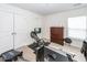Well-lit exercise room featuring an indoor rowing machine, a dresser, and ample space for workouts at 415 True North Trail, Summerville, SC 29486