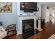 Elegant fireplace with a black marble surround and white mantle at 415 True North Trail, Summerville, SC 29486