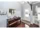 Welcoming foyer with hardwood floors, neutral paint, and stylish decor at 415 True North Trail, Summerville, SC 29486