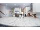 Spacious kitchen with a large island, white cabinets, and stainless steel appliances at 415 True North Trail, Summerville, SC 29486