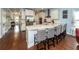 Gourmet kitchen features stainless appliances, granite countertops, a breakfast bar and hardwood floors at 415 True North Trail, Summerville, SC 29486