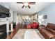 Bright living room with hardwood floors, a ceiling fan, and an open layout at 415 True North Trail, Summerville, SC 29486