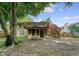 Backyard has a wooden deck and screened-in porch, adding outdoor living space to the property at 4606 Moss Ct, North Charleston, SC 29420
