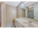 This bathroom features a long vanity, a large mirror, and a separate room for the shower, offering convenience at 4606 Moss Ct, North Charleston, SC 29420