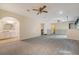 Spacious bedroom features neutral carpeting, ceiling fans, and an attached bathroom, creating a comfortable retreat at 4606 Moss Ct, North Charleston, SC 29420