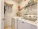 A laundry room featuring a washer, a dryer and wire racks for storage at 4606 Moss Ct, North Charleston, SC 29420