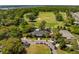Aerial view of golf course and community clubhouse at The Plantation at Stono Ferry in South Carolina at 5195 Forest Oaks Dr, Hollywood, SC 29449