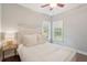 Serene bedroom with hardwood floors and lots of natural light at 5195 Forest Oaks Dr, Hollywood, SC 29449