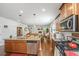 Well-equipped kitchen with granite countertops, stainless steel appliances, and a view to the open living and dining space at 5442 Clearview Dr, North Charleston, SC 29420