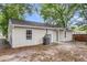 Backyard with an AC unit near the home's exterior and a wood fence along the perimeter of the property at 5817 Canterbury Dr, Hanahan, SC 29410