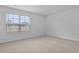 Bedroom with a window and carpeted floor at 6039 Savy Ct, Ravenel, SC 29470