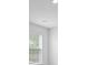 Bright bedroom with neutral carpet, a window, and white walls at 6039 Savy Ct, Ravenel, SC 29470
