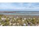 Beautiful aerial view of the coastal property and a breathtaking marsh landscape at 622 E Cooper Ave, Folly Beach, SC 29439