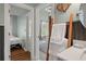 Hallway to bedroom with a ladder towel rack, and modern sink at 622 E Cooper Ave, Folly Beach, SC 29439