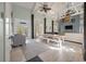 Bright open living space with a high ceiling and elegant decor with lots of natural light at 622 E Cooper Ave, Folly Beach, SC 29439