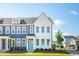 Charming townhomes showcasing craftsman-style architecture with eye-catching blue and white exteriors at 757 Blueway Ave, Summerville, SC 29486