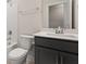 Bathroom with tub and shower combo and dark vanity with white marbled top at 769 Maynard Ln, Summerville, SC 29486