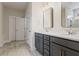 Stylish bathroom with double vanities, large mirrors, and modern fixtures at 769 Maynard Ln, Summerville, SC 29486