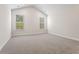 Spacious carpeted bedroom with natural light from two windows at 769 Maynard Ln, Summerville, SC 29486