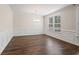Elegant dining room with wainscoting, a chandelier, and large windows at 769 Maynard Ln, Summerville, SC 29486