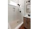 Bathroom featuring a shower with a matte black faucet and an oak vanity at 8 Pitt St # A, Charleston, SC 29401